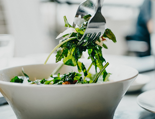 A bowl full of healthy and nutritious salad greens.